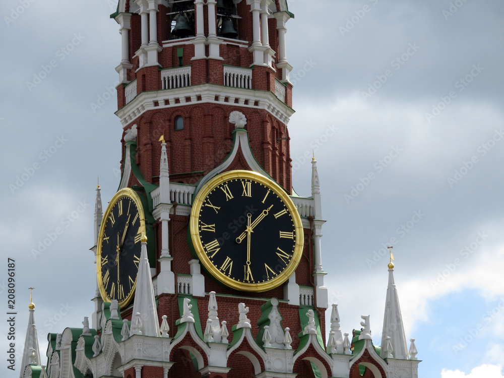 Chimes of the Moscow Kremlin. Spasskaya tower on Red square against a dramatic dark sky