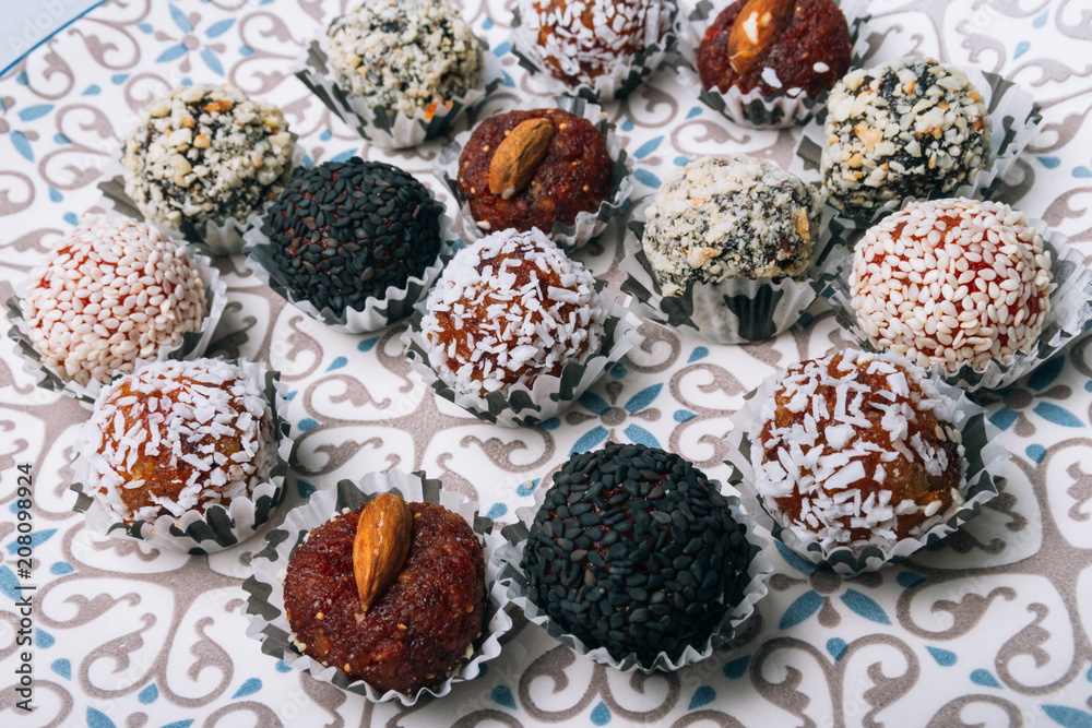 sweets from dried fruits with nuts and sesame seeds sweets from dried fruits with nuts and sesame seeds