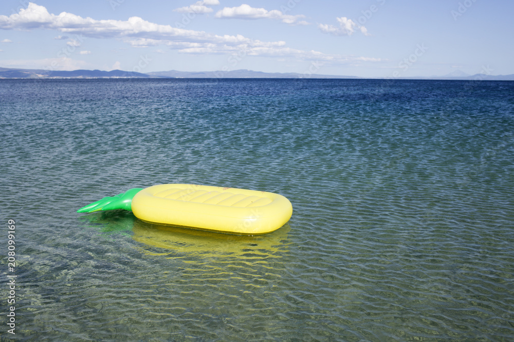 Inflatable mattress float in sea. Air mattress on blue water on sunny  seascape. Summer vacation on beach. Travelling or trip and wanderlust.  Discovery and adventure Stock Photo | Adobe Stock