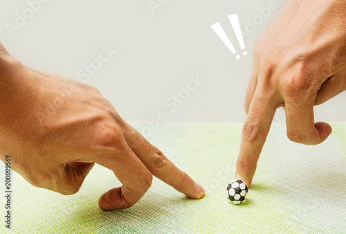Wallpaper Mural Playing socker made by paper with  fingers,The human use fingers slice paper football,Dangerous while playing football Torontodigital.ca