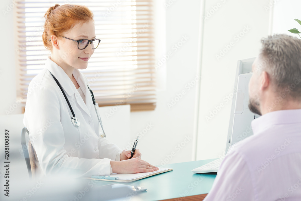 Urologist consulting problem with patient Urologist consulting problem with patient