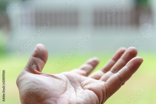 Fotografi Close up of Hand stick out, fortune, Lucky, predestain, sucess, fate, everything is on your hands concept