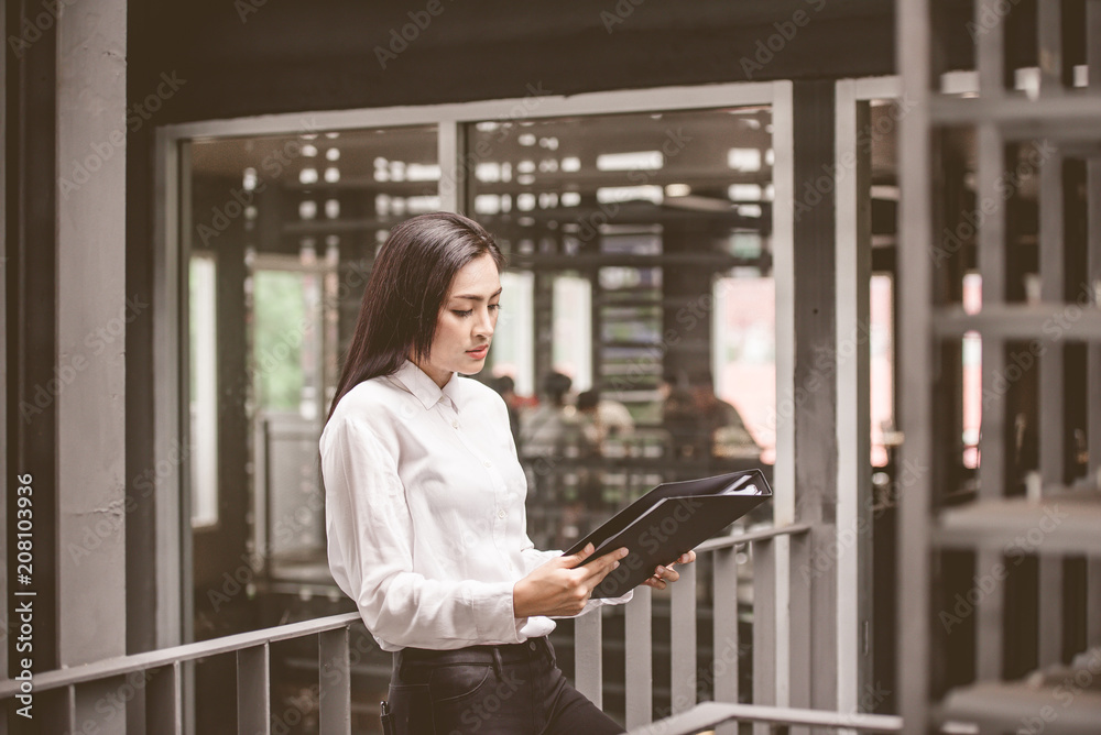business black woman holding files business black woman holding files