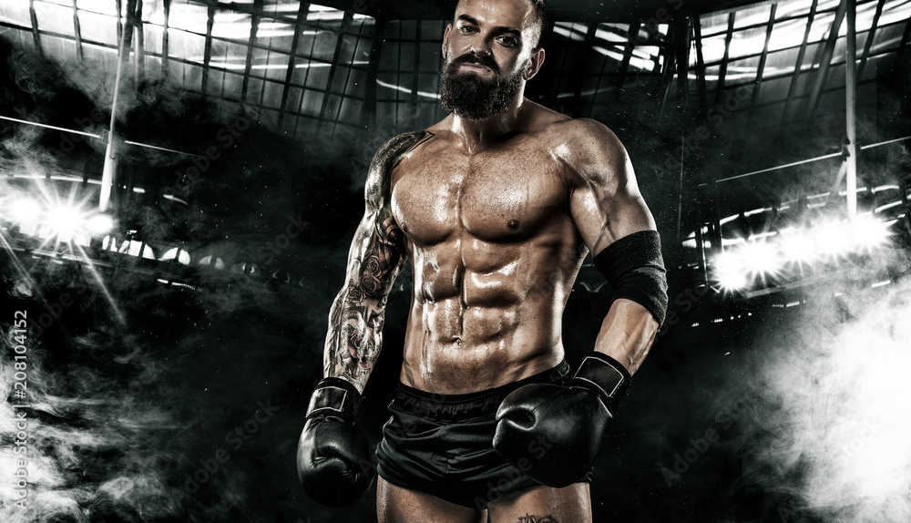 Sportsman boxer fighting in the cage. Copy Space. Boxing sport concept. Sportsman boxer fighting in the cage. Copy Space. Boxing sport concept.