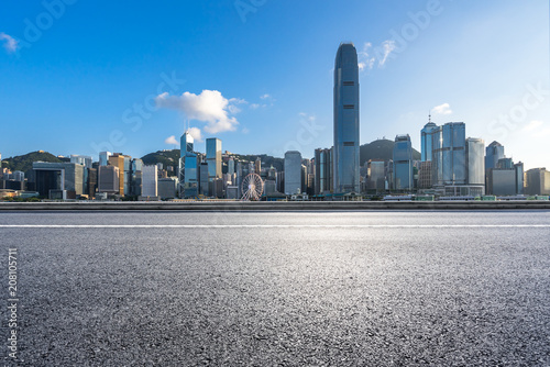 empty asphalt road with city skyline in hongkong china