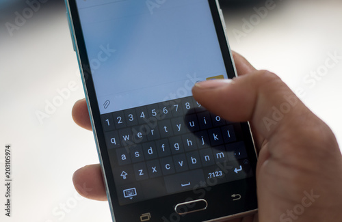 smart phon and hand  touch on keypad