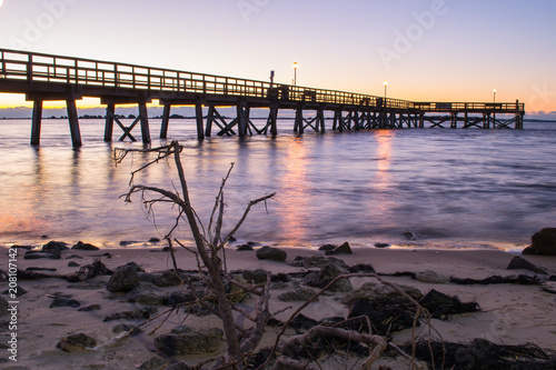 Dock at sunrise in Southport  North Carolina beach vacation destination.