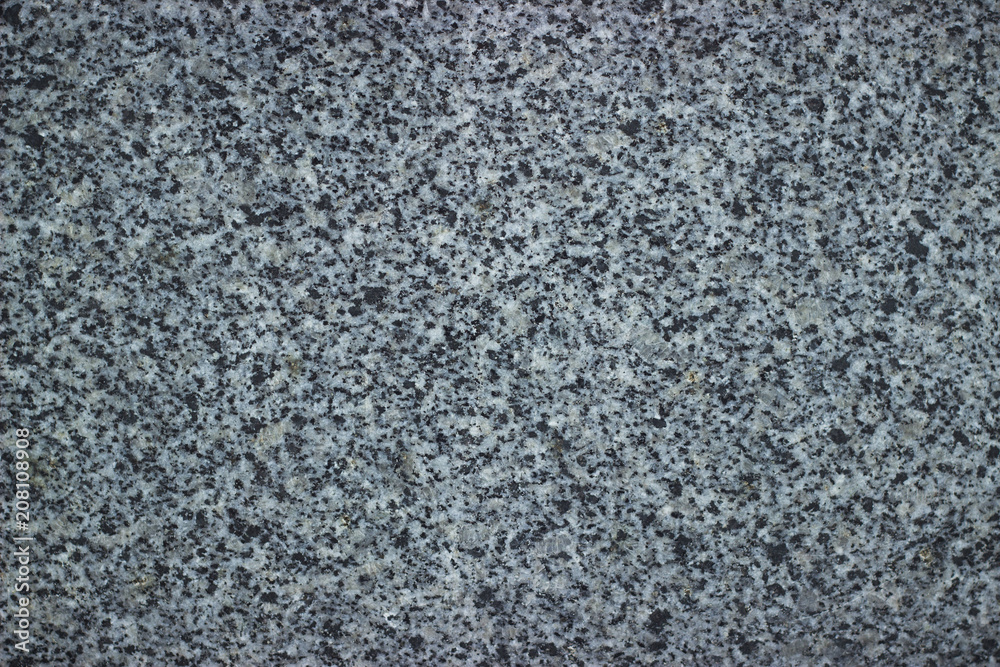 Stone pavement texture. Granite cobblestoned background.