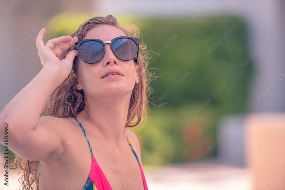 Close-up portrait of happy smiling attractive blond curly hair woman , Summer holidays concept. Close-up portrait of happy smiling attractive blond curly hair woman , Summer holidays concept.