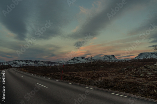 Road in Abisko National Park and Torneträsk Lake at sunset / Lapland, Sweden © Bild in motion
