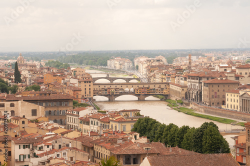 View of Ponte Vecchio. Florence, Italy. Old bridge in Florence view to the Arno River. Famous for the goldsmith shops and the Vasari Corridor.