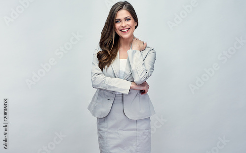 Classic business portrait of smiling woman with long hair wearin photo