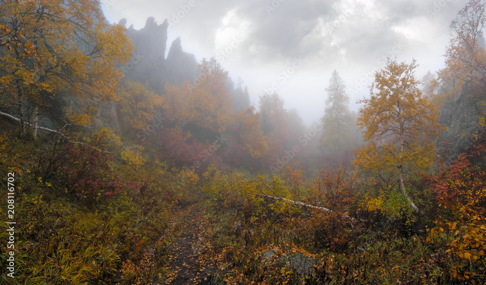 Autumn valley in mist. Taganay National Park. Ural, Russia