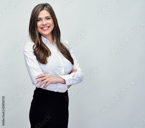 studio portrait of smiling positive business woman.