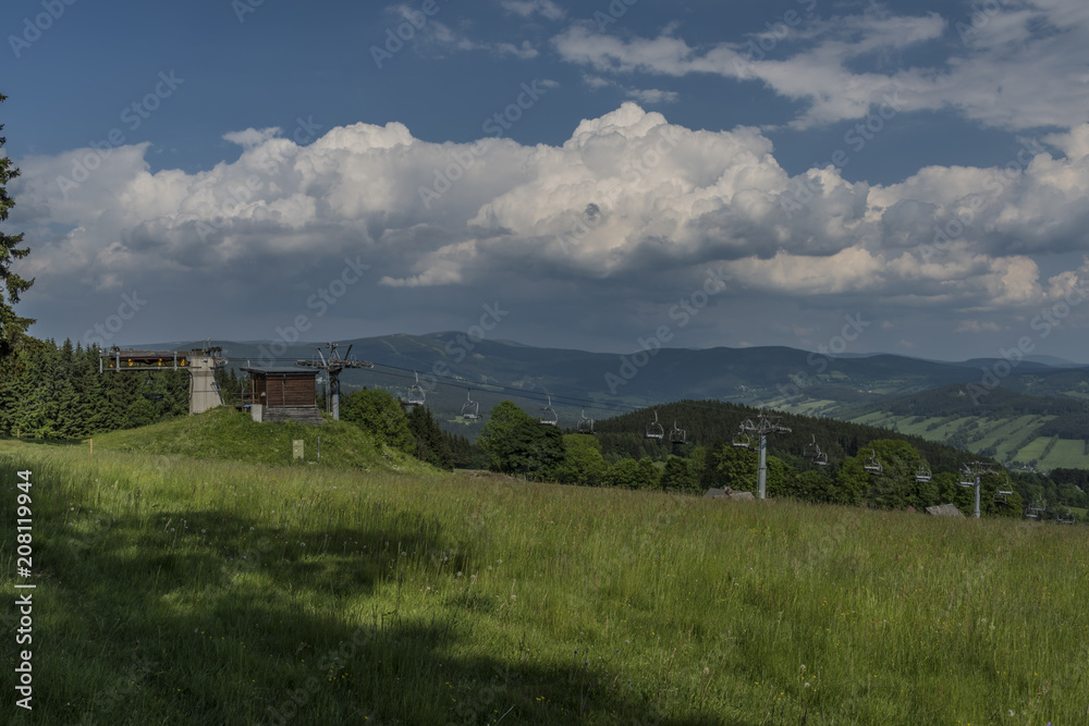 Paseky nad Jizerou village in spring sunny day Paseky nad Jizerou village in spring sunny day