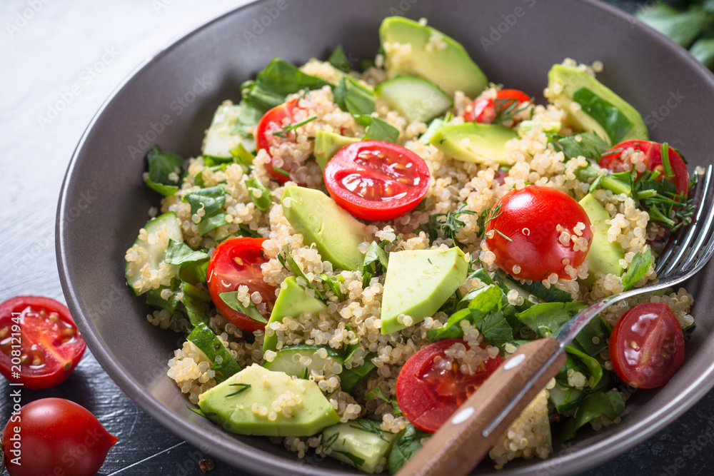 Quinoa salad with spinach, avocado and tomatoes Quinoa salad with spinach, avocado and tomatoes
