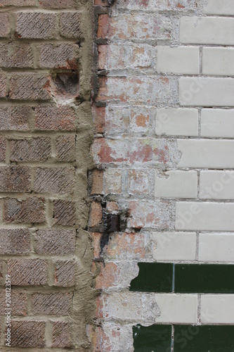 a degraded brick wall