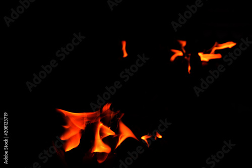 close up fire flames abstract on black background © paisan191