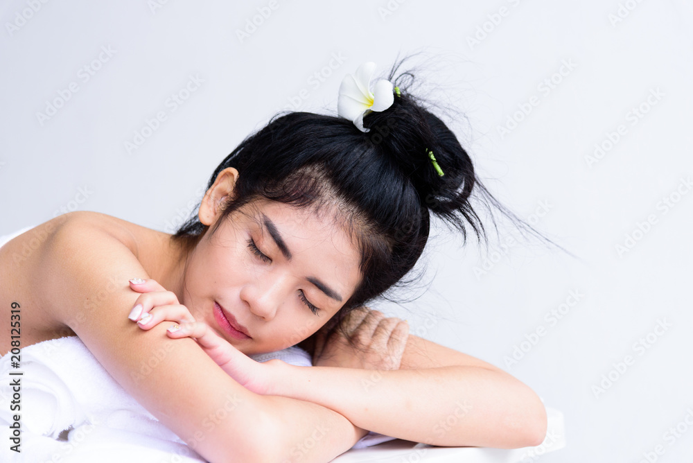 Portrait of beautiful asian people with close up view and close up eyes and having hand massage in spa salon. Beauty, healthy, spa and relaxation concept. Portrait of beautiful asian people with close up view and close up eyes and having hand massage in spa salon. Beauty, healthy, spa and relaxation concept.