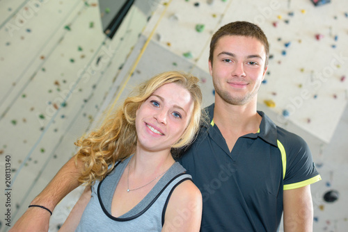 Young couple at indoor climbing center