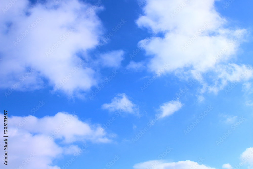 Obraz premium Beautiful blue sky and white cumulus clouds. Background. Landscape.