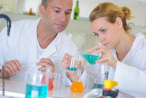 Man and woman working in laboratory