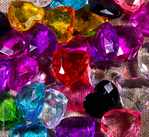 Background of colored gemstones on a linen basis.