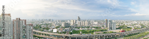 Aerial view of city, Landscape of Bangkok city skyline in Aerial view with skyscraper, modern office building and blue sky with cloudy sky background in Bangna Bangkok, Thailand.