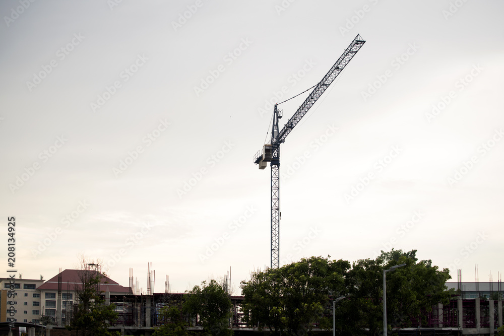 Construction cranes are working on handling In the morning Construction cranes are working on handling In the morning