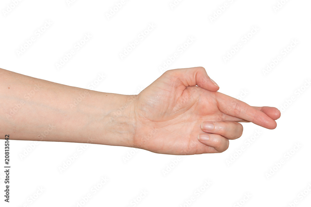 Caucasian woman's hand with fingers crossed. Wishing for good luck or hoping to get away with a lie. Isolated on white.