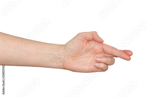 Caucasian woman's hand with fingers crossed. Wishing for good luck or hoping to get away with a lie. Isolated on white.