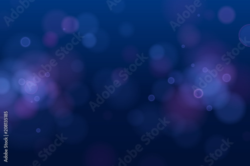 Abstract defocused circular blue bokeh light on dark background. EPS 10