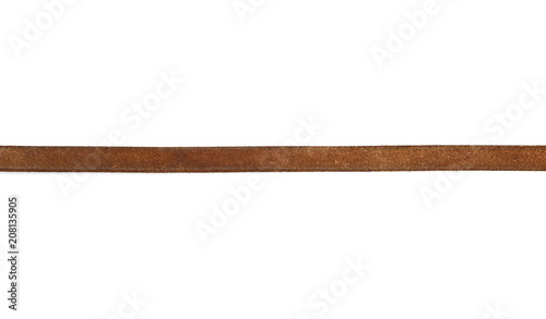 Old, brown leather belt, strap isolated on white background photo