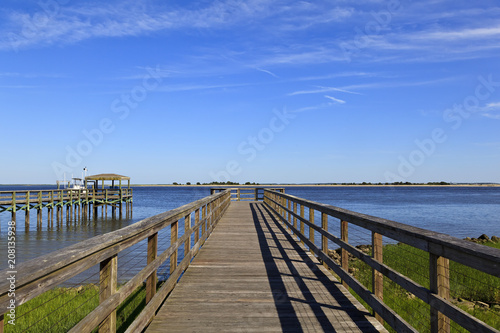 Wood boardwalk at Waterfront Park in Southport  North Carolina in the summer