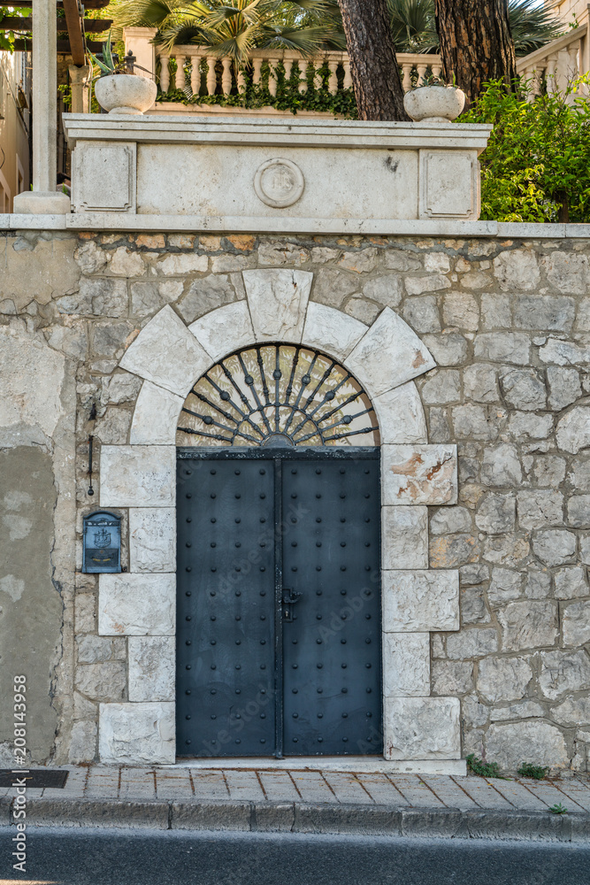 Stone wall and steel door Dubrovnik, Croatia