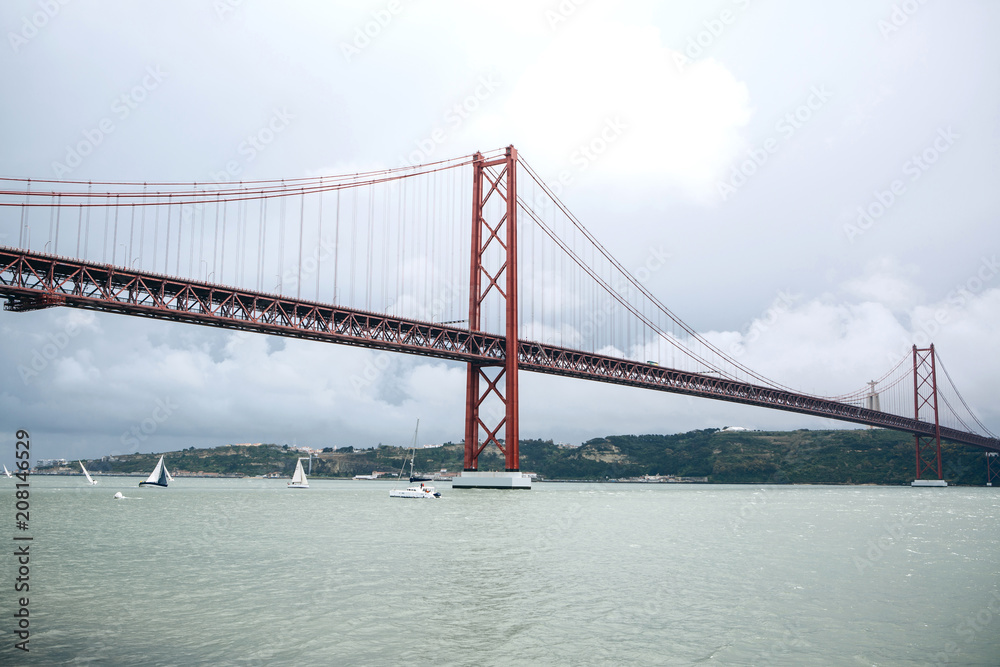 Bridge called April 25 in Lisbon in Portugal against the sky