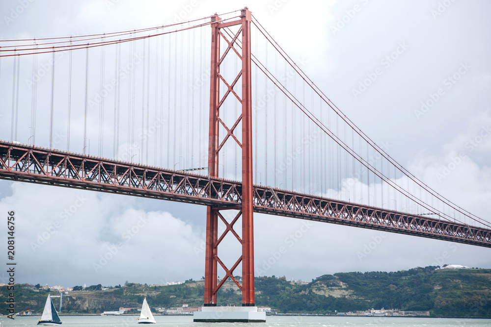 Obraz premium Bridge called April 25 in Lisbon in Portugal against the sky