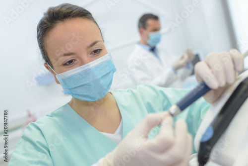 portrait of female dentist in dental clinic