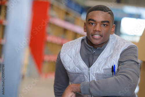 portrait of young man warehouse worker