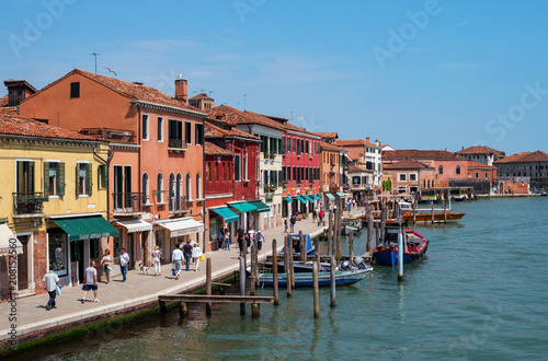 Island Murano in Venice Italy. View on canal with boat and motorboat water. Picturesque landscape. Traditional view of The Venetian canals © oktober64