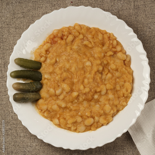 Puree with beans with pickled cucumbers photo