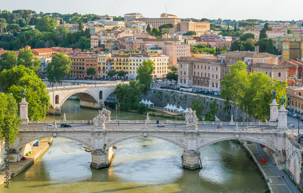 Rome skyline as seen from Castel Sant'Angelo, with the bridges of Vittorio Emanuele II and Prince Amedeo Savoia Aosta over the Tiber river.