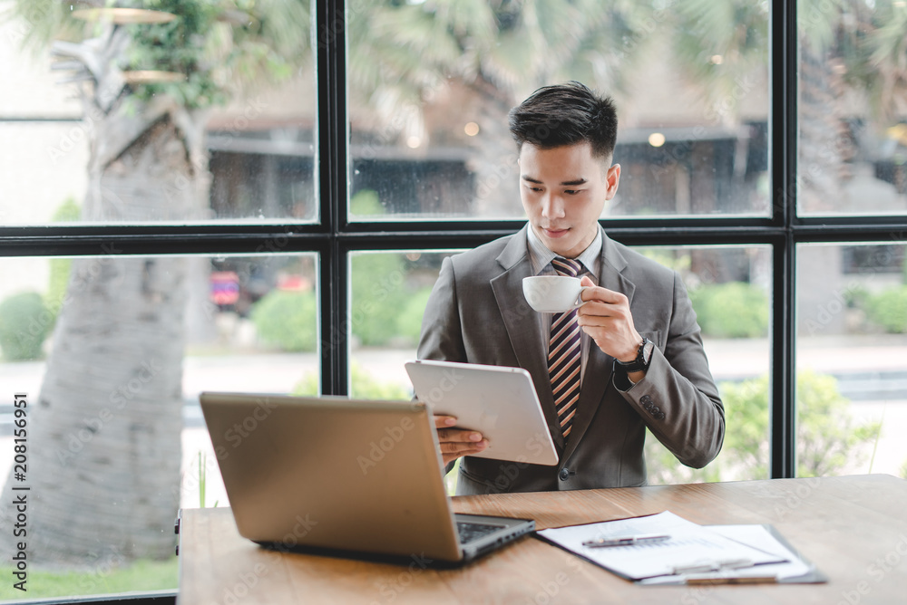 business man working with documents and laptop business man working with documents and laptop