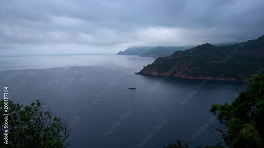 Coastline of Corsica with remote beach and beautiful nature on cloudy day Coastline of Corsica with remote beach and beautiful nature on cloudy day