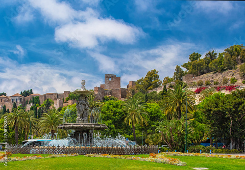 Fountain with the Alcazaba of Malaga, Spain