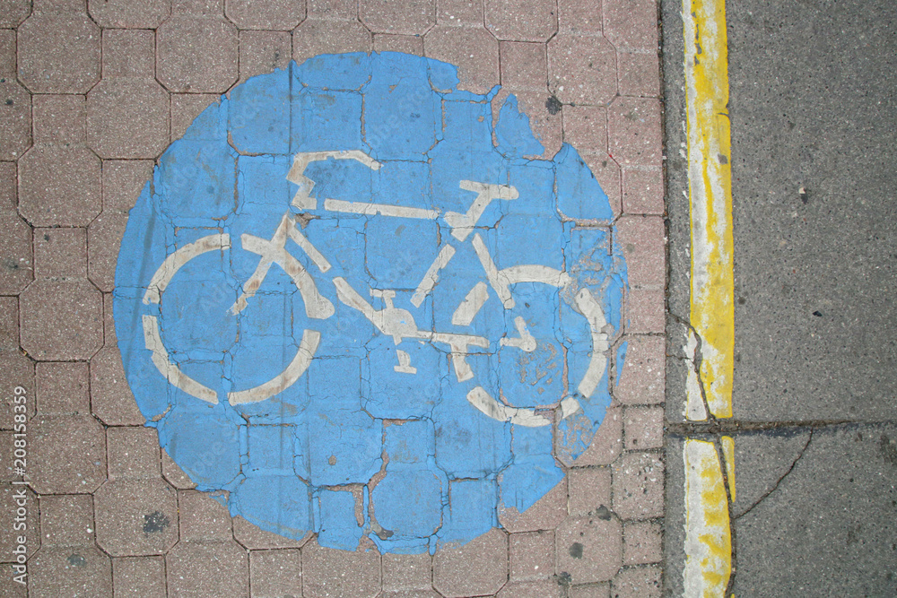 
Blue bicycle sign on the floor