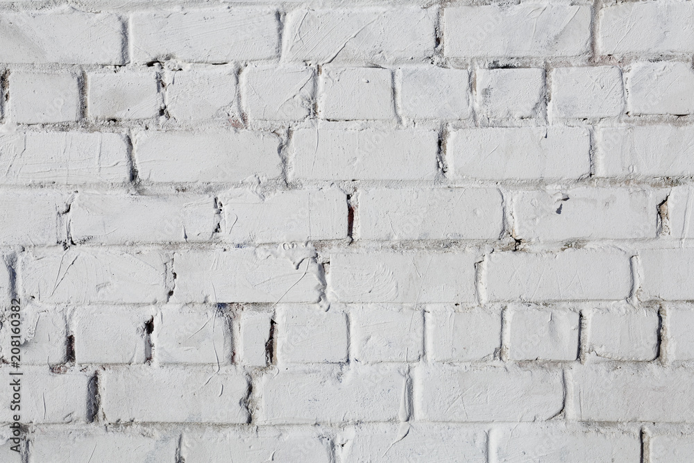 Fototapeta premium White brick wall, perfect as a background, square photograph