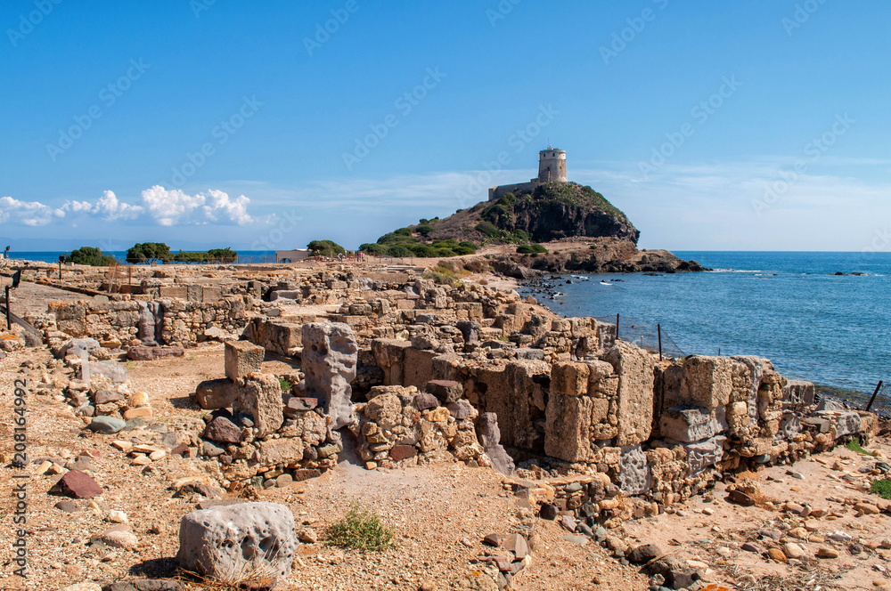 Old Genoa Tower above the sea in the Nora, Sardinia