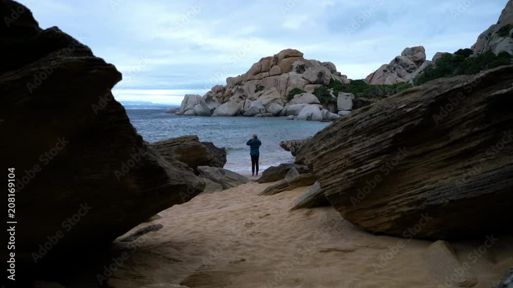 Coastline of Sardinia with remote beach and beautiful nature on cloudy day Coastline of Sardinia with remote beach and beautiful nature on cloudy day