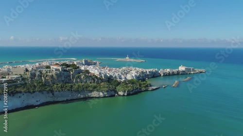 Polignano a Mare Apulia City Sea Coastline white houses ana castle in Italy Drone flight photo